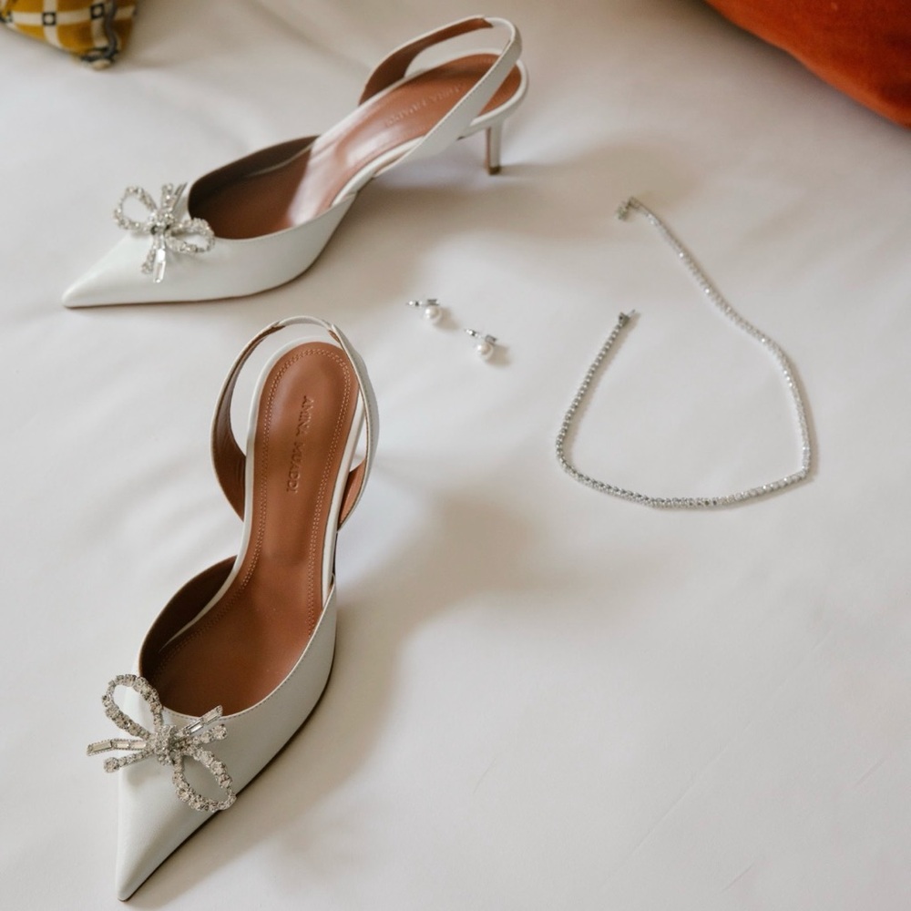 Amina Muaddi Ivory Slingback Heels with Crystal Embellishment